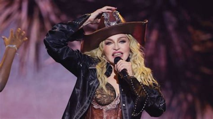Madonna stuns in daring leather corset and fishnet tights in new photos during Celebration Tour